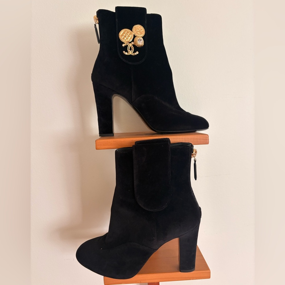 CHANEL Black Heeled Boots with Gold Details